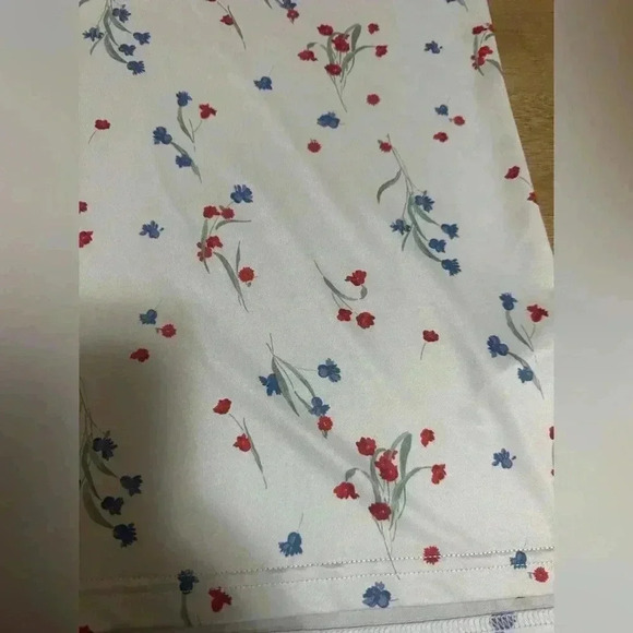 Tuckernuck Sport Hyannis Floral Sleeveless Polo - Picture 3 of 10